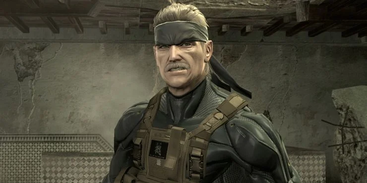 Otacon critiques a photograph in Metal Gear Solid 2